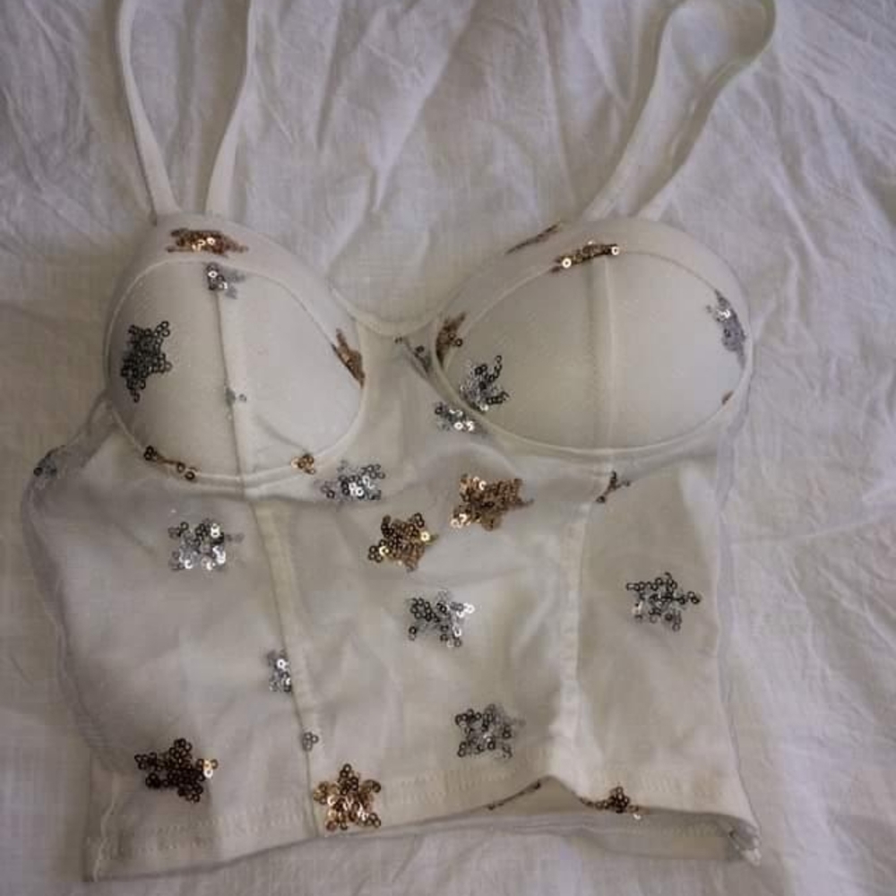 White tank with good and silver stars